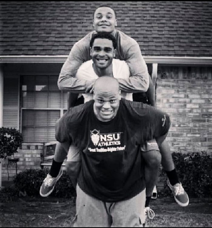 Jace Prescott carries brothers Dak and Tad on his back in a playful photo
